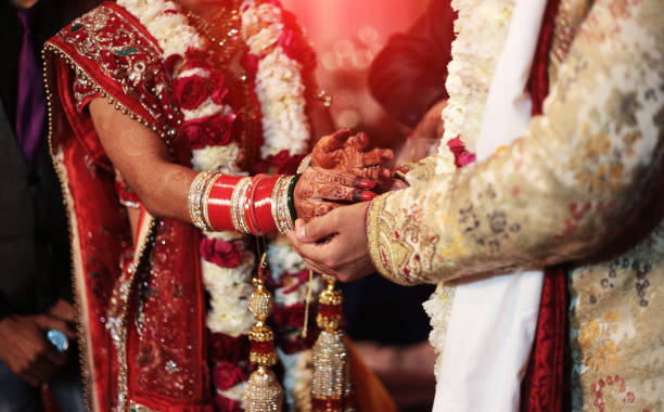 Happy Indian couple in traditional wedding attire